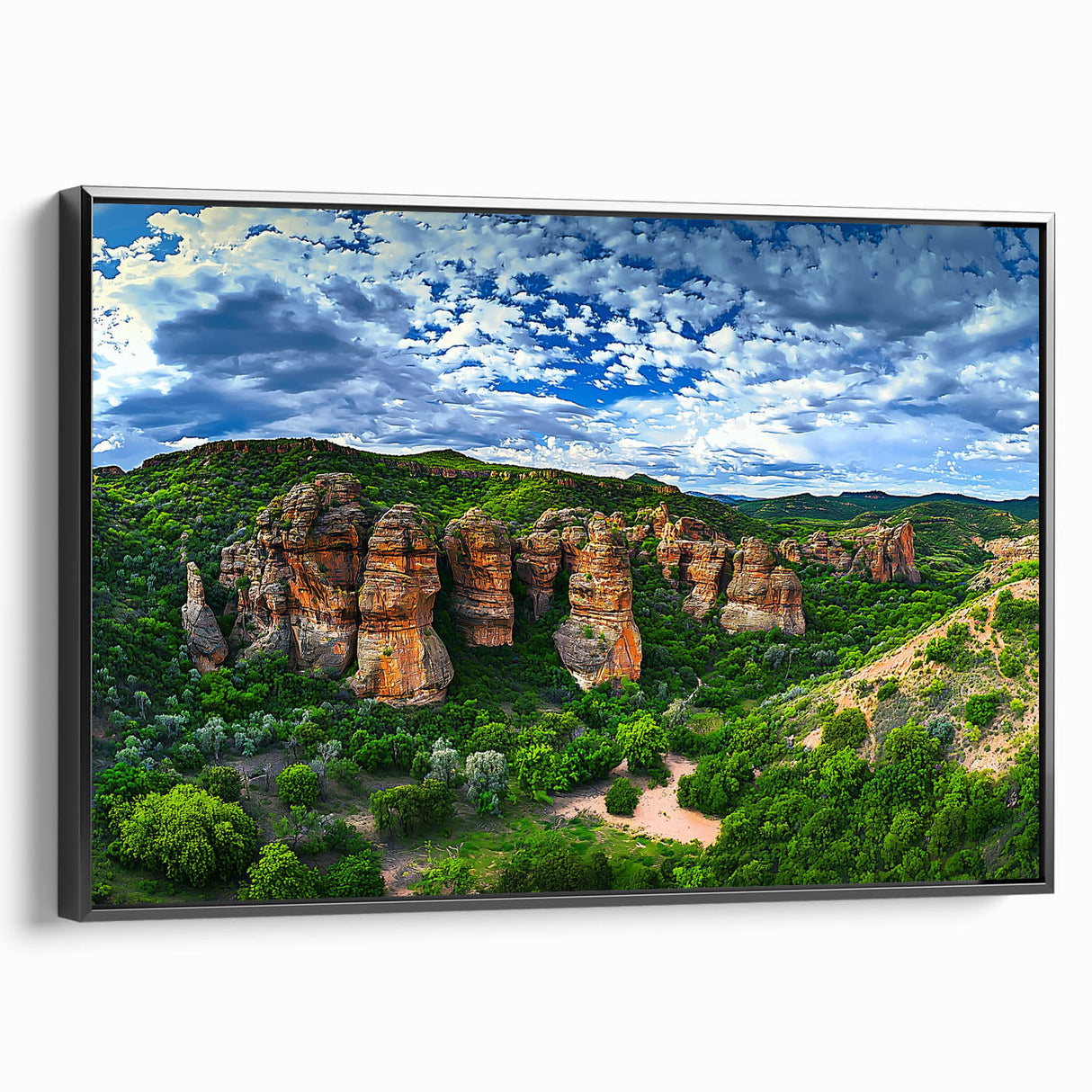 Framed canvas artwork depicting a stunning landscape with dramatic cliffs, showcasing vibrant colors and intricate details, designed to enhance any modern decor.