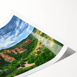 Stunning rolled print of a dramatic cliff landscape showcasing vibrant colors and intricate details, beautifully packaged in a protective cardboard tube for easy display.