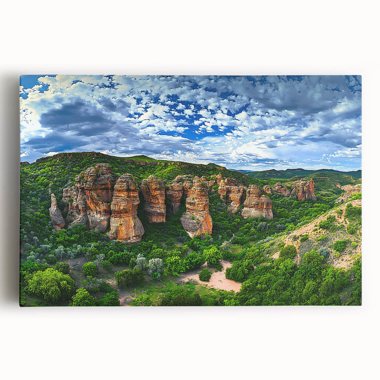 Stretched canvas artwork depicting a dramatic cliff landscape with vibrant colors and detailed textures, ideal for enhancing modern home decor or gallery spaces.