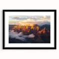 Black-framed landscape artwork depicting canyons, featuring a white mat around the image, perfect for home or office decor, enhancing any modern aesthetic.