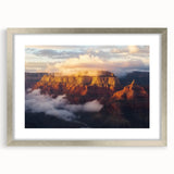 Framed landscape print showcasing majestic canyons with a silver mat, perfect for adding a touch of natural beauty to home decor. Ideal for nature enthusiasts and art lovers.