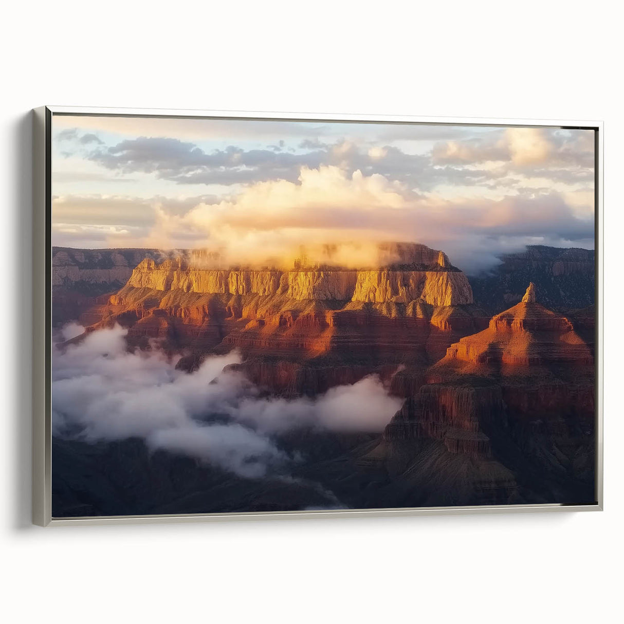 Framed landscape canvas print showcasing a breathtaking view of canyons with rich earthy tones, elegantly bordered in silver for a modern aesthetic. Perfect for enhancing home decor.
