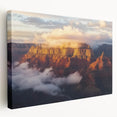 Vibrant landscape canvas art depicting a breathtaking view of canyons with rich earth tones, perfect for adding depth and character to any room decor.