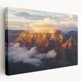 Vibrant landscape canvas art depicting a breathtaking view of canyons with rich earth tones, perfect for adding depth and character to any room decor.