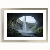 Framed landscape artwork depicting a serene cave scene, featuring a silver mat and elegant frame, ideal for home decor with a modern touch.