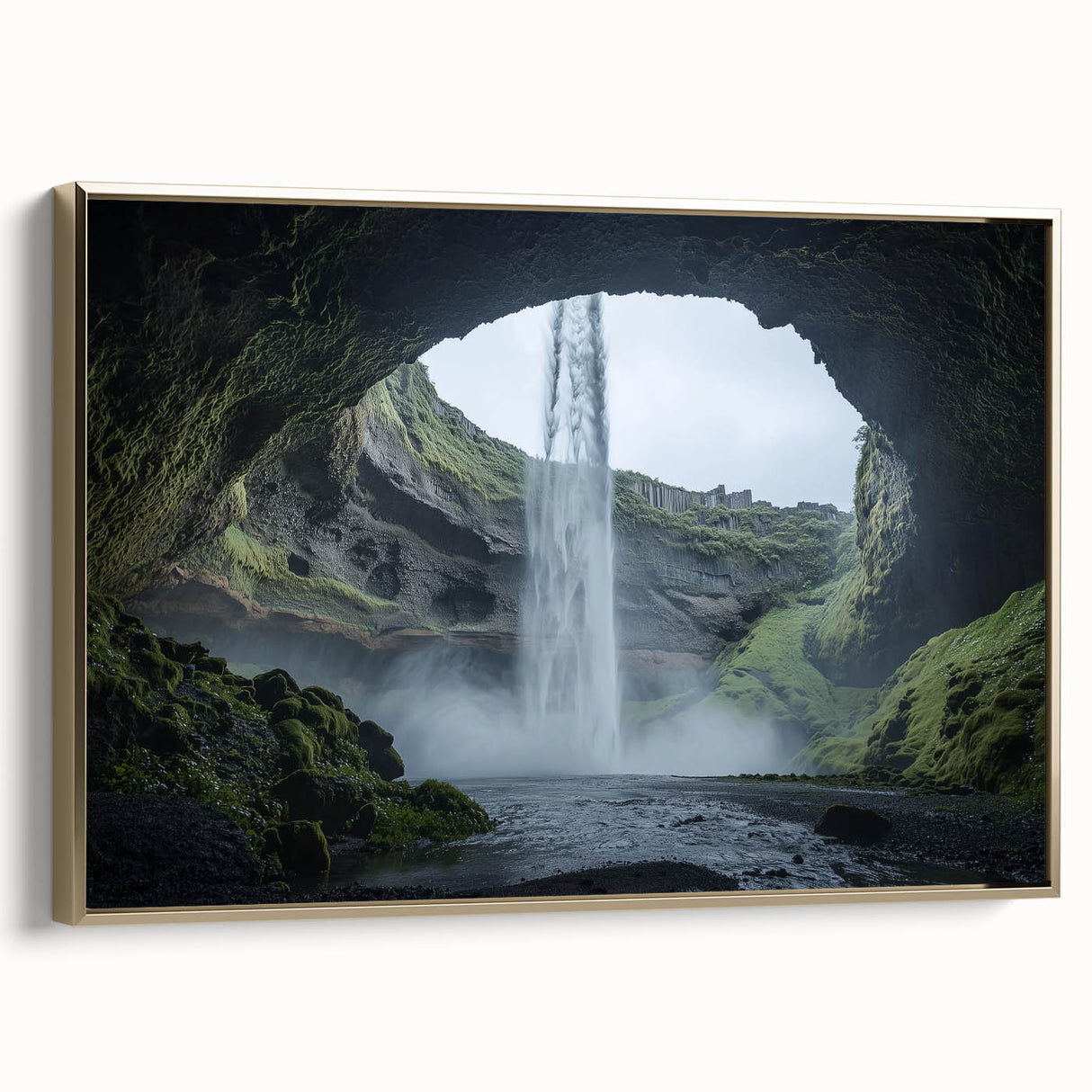 Framed canvas artwork showcasing a stunning landscape with cave formations, accented by a gold frame. Ideal for adding a touch of elegance to modern decor.