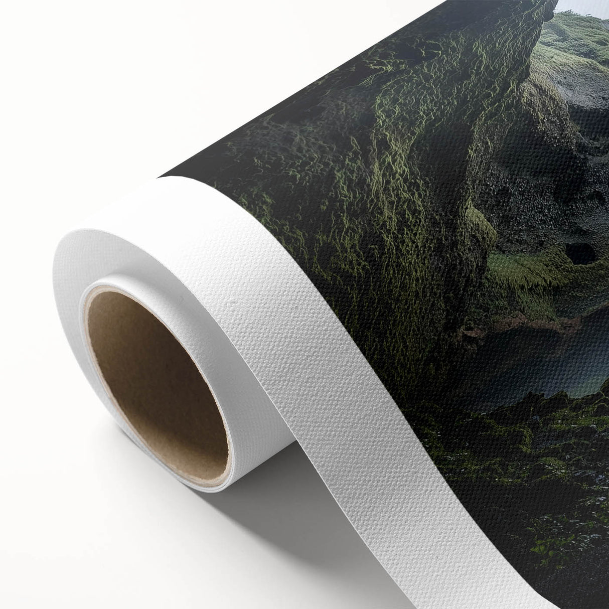 Rolled canvas showcasing a vibrant landscape scene with caves and natural formations, featuring rich colors and intricate details, perfect for home decor.