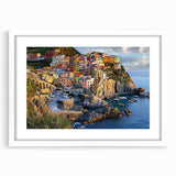 Framed landscape artwork showcasing dramatic cliffs with lush greenery, featuring a white mat for an elegant presentation, ideal for enhancing home decor.