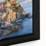 Close-up of a framed canvas print depicting dramatic cliffs in a vibrant landscape, showcasing rich colors and intricate textures that enhance its artistic appeal.