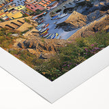 Vibrant rolled canvas artwork depicting dramatic cliffs and serene landscapes, showcasing rich colors and textures, ideal for modern home decor.