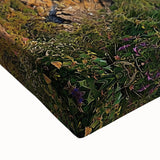 Close-up of a vibrant stretched canvas depicting dramatic cliffs and landscapes, showcasing rich colors and textures, perfect for home decor enhancement.