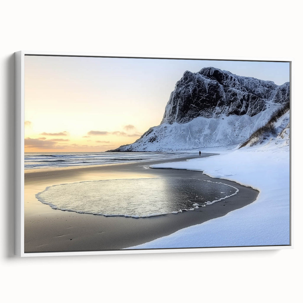 Framed canvas artwork showcasing a serene beach landscape with soft blue skies and gentle waves, elegantly displayed on a white frame, perfect for home décor.