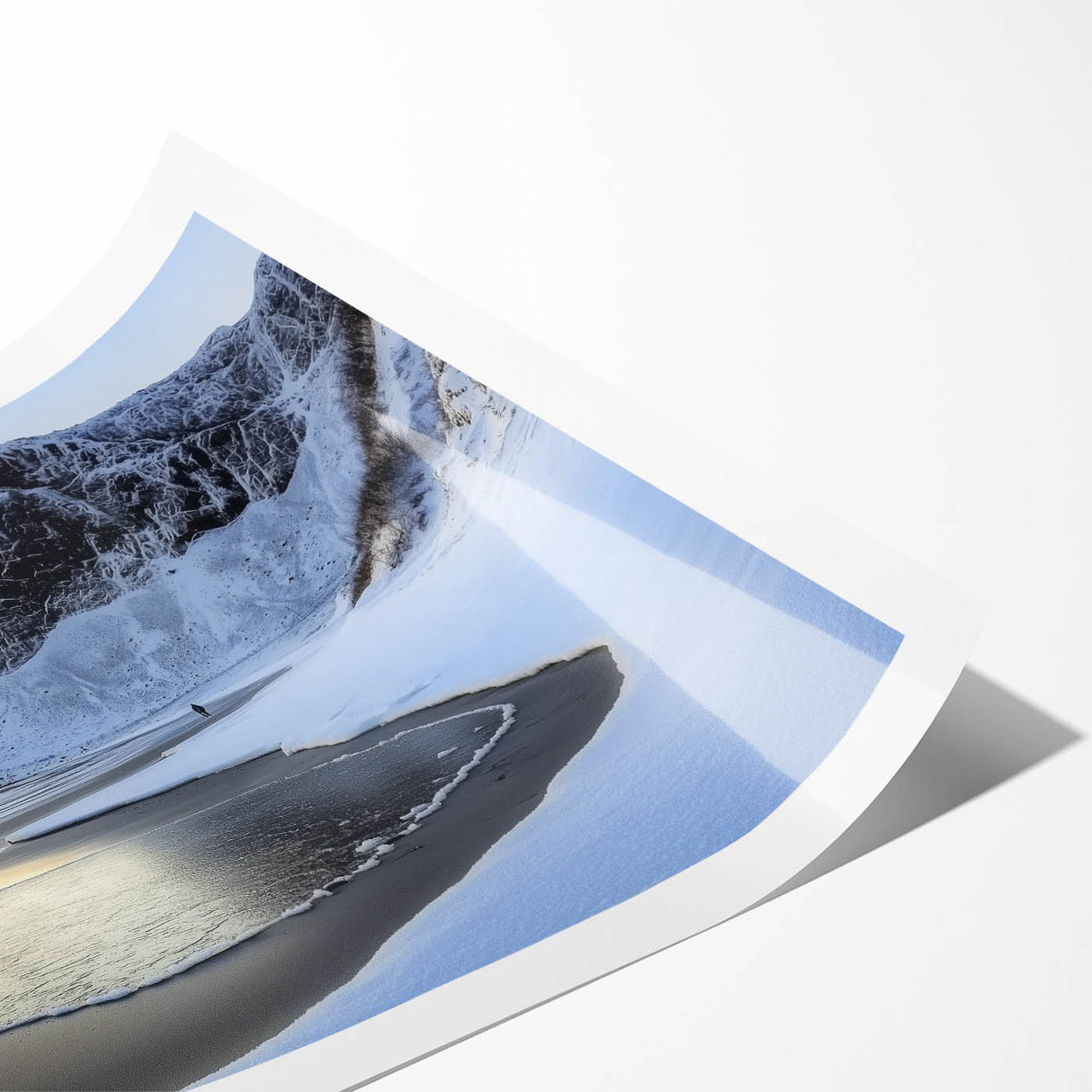Stunning rolled print of a serene beach landscape featuring soft blue waves and golden sand, ideal for coastal decor enthusiasts. Packaged securely for easy display.