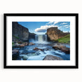 Framed landscape artwork showcasing a stunning canyon scene, featuring vibrant earth tones and a sleek black mat. Ideal for home decor and nature enthusiasts.