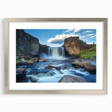 Framed landscape art print showcasing stunning canyons in vibrant colors, accented with a sleek silver mat, perfect for enhancing modern home decor.