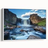 Framed canvas artwork of a vibrant canyon landscape, showcasing rich colors and textures, displayed against a white background for an elegant presentation. Ideal for nature-inspired home decor.