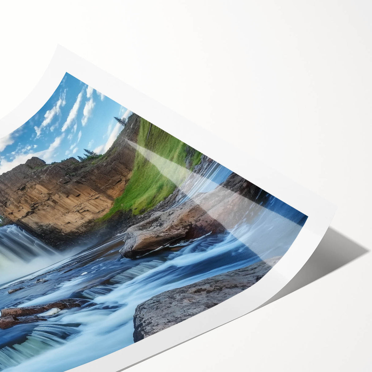 Stunning landscape print of colorful canyons showcasing vibrant hues of red and orange, rolled for easy shipping in a protective cardboard tube. Perfect for home decor.