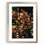 Textured abstract art print featuring warm autumnal hues on a framed silver mat, ideal for bedroom wall decor.