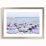 Textured abstract art print in muted earth tones on a framed canvas, ideal for modern bedroom ambiance.