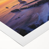 Stunning rolled canvas depicting vibrant landscapes with dramatic cliffs and a serene sky, elegantly packaged in a robust cardboard tube for safe delivery.