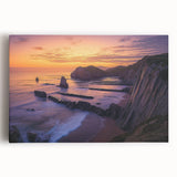 Stretched canvas artwork depicting a breathtaking landscape of towering cliffs against a vibrant sunset, showcasing rich colors and dramatic lighting, ideal for home decor.