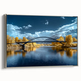 Framed canvas artwork depicting a serene landscape bridge scene, featuring rich colors and intricate details, set in a sleek silver frame to enhance decor.