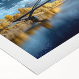 Rolled canvas showcasing a vibrant landscape bridge design with rich colors, ideal for home decor or art enthusiasts, securely packaged in a protective tube.