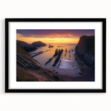 Framed landscape artwork showcasing dramatic cliffs, mounted with a black mat for an elegant touch, perfect for modern home decor or office settings.