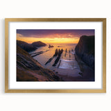 Elegant gold-framed landscape artwork showcasing a serene cliff scene, complete with a white mat for added depth, perfect for enhancing home decor.