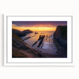 Framed landscape artwork depicting rugged cliffs with a white mat, showcasing natural beauty and elegance, perfect for home decor aesthetics.