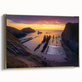 Framed canvas artwork depicting a stunning cliff landscape with golden accents, showcasing vivid colors and intricate details, perfect for home decor.