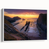 Framed canvas artwork depicting a stunning cliff landscape in vibrant colors, showcasing detailed textures and natural beauty against a white background, perfect for home decor.