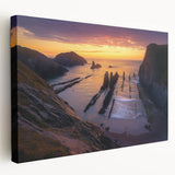 Stretched canvas artwork depicting vibrant landscapes with dramatic cliffs and a side view perspective, ideal for home decor and nature enthusiasts.