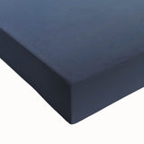 Close-up of a stretched canvas print depicting a serene landscape with a bridge, featuring vibrant colors and detailed textures, perfect for home decor.