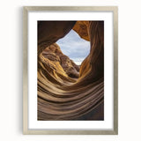 Silver-framed landscape print showcasing vibrant canyons with a matte finish, ideal for home decor. Perfect for adding a touch of nature-inspired elegance.