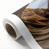Stunning landscape canvas print showcasing vibrant canyons in rich earth tones, rolled for easy transport and display, ideal for home decor enthusiasts.