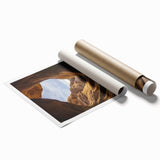 Vibrant landscape print showcasing majestic canyons under a bright blue sky, rolled neatly for easy shipping, perfect for home decor enthusiasts.