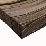 Close-up of a stretched canvas artwork depicting vibrant canyons with rich colors and textured details, perfect for enhancing living spaces and art collections.