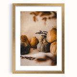 Textured abstract art print depicting autumn hues on a gold-framed canvas, ideal for extra large wall art in a living room.