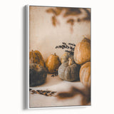 Vintage poster art of fall season on framed canvas, featuring colorful leaves against a black background.
