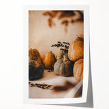 Rolled print of autumnal floral art in warm red and orange tones, suitable for dining room wall decor.