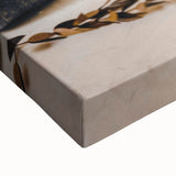 Large art featuring a black and white landscape painting on stretched canvas, depicting autumn trees.