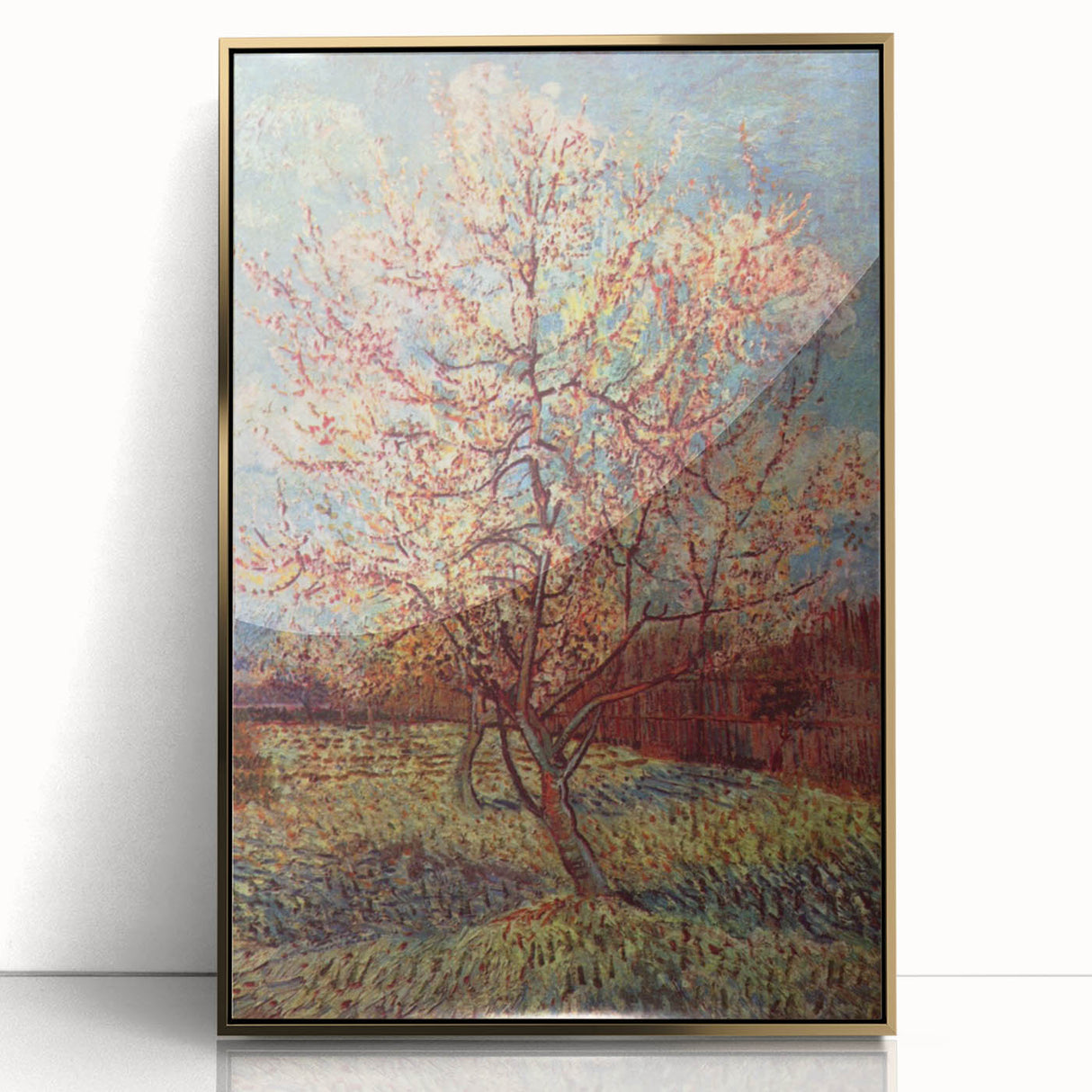 Large art print of a Van Gogh-inspired scene on gold-framed acrylic, featuring bold blue and yellow tones.