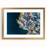 Framed landscape art depicting majestic cliffs with a gold mat, perfect for enhancing home decor. The artwork showcases vibrant colors and intricate details.