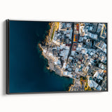 Framed canvas artwork depicting a dramatic landscape with cliffs, showcasing vibrant colors and intricate details, viewed from the side with a sleek black frame.