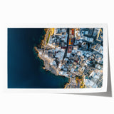 Stunning rolled print of a vibrant cliff landscape, showcasing rich hues of blue and green, expertly packaged in a protective cardboard tube for safe delivery. Ideal for enhancing home decor with nature-inspired art.