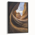 Framed canvas artwork depicting a stunning landscape of canyons, featuring rich earthy tones and dramatic rock formations, presented in a sleek black frame, perfect for home decor.