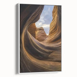 Framed canvas artwork depicting a vibrant landscape of canyons with rich earth tones, showcased from a white side view, perfect for modern home decor.