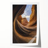 Stunning rolled landscape print showcasing vibrant canyons with rich earth tones and dramatic rock formations, ideal for enhancing home decor aesthetics.