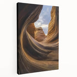 Stretched canvas artwork depicting a vibrant landscape of canyons, showcasing rich earth tones and dramatic rock formations, perfect for home decor.